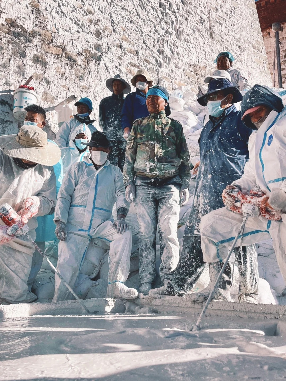 It’s that time of year again for the annual wall painting and dressing of the Potala Palace