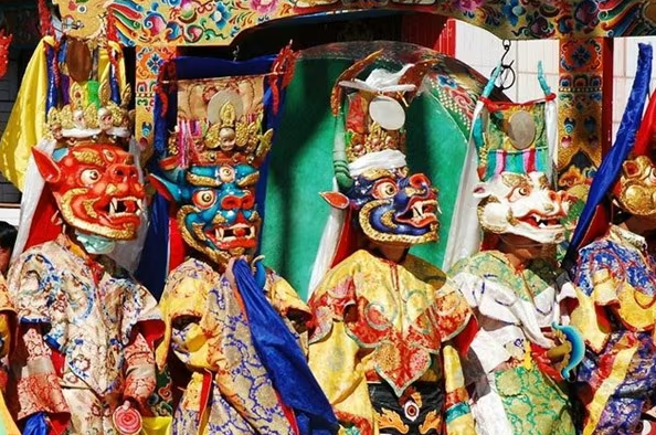 The traditional dance with ceremonial mask during Losar Festival